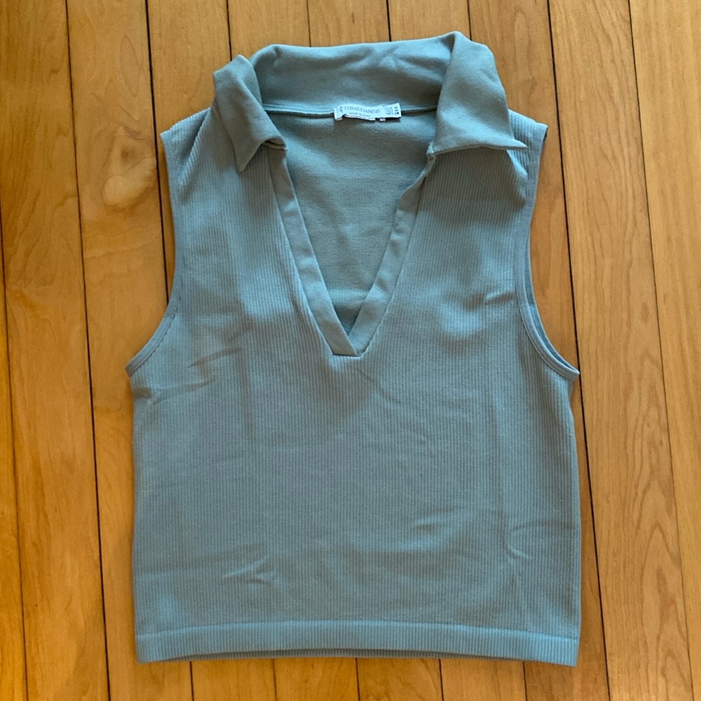 Light green ribbed tank top. Size M.